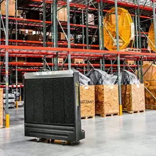 big ass fan brand greenhouse evaporative cooler in warehouse setting with visible branding text