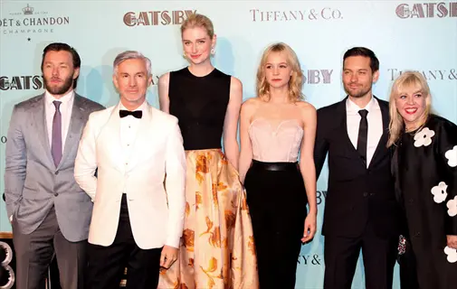 cast and director at 'the great gatsby' premiere against branded backdrop