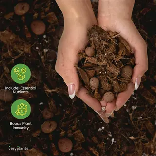 hands holding veryplants' organic compost potting soil with nutrient boost and plant immunity icons