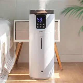 modern small room humidifier emitting steam in sunlit bedroom, digital display shows '58', beside nightstand and potted plant