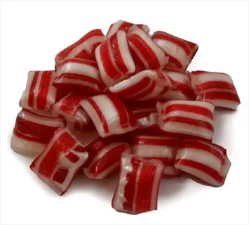 pile of red and white striped peppermint candies