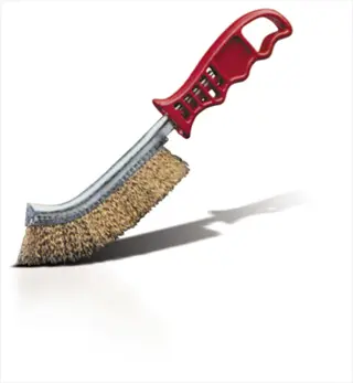 potato cleaning brush with red plastic handle and stiff metal bristles, isolated on white background