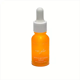 pretty farm girl rose glow natural anti aging serum in orange glass dropper bottle with botanical formula