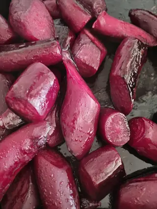 sliced cylindra beets with cylindrical shape and vibrant red-purple hue